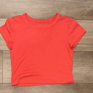 American Eagle Vibrant Orange babydoll  Tee size xsmall